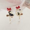 Bow cartoon character cat earrings